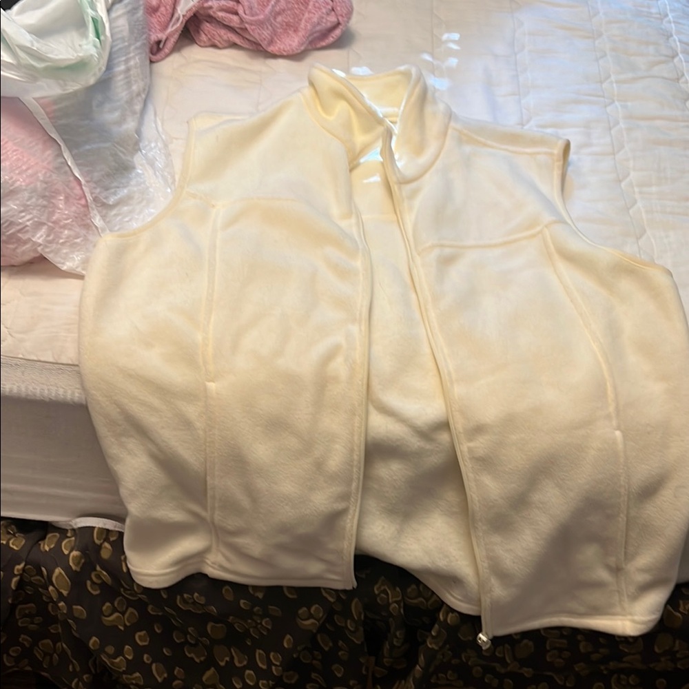 Cream Sleeveless Vest with Full Zipper Closure